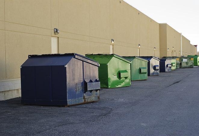 an arrangement of durable and robust disposal containers utilized on a construction project in Laurens, NY